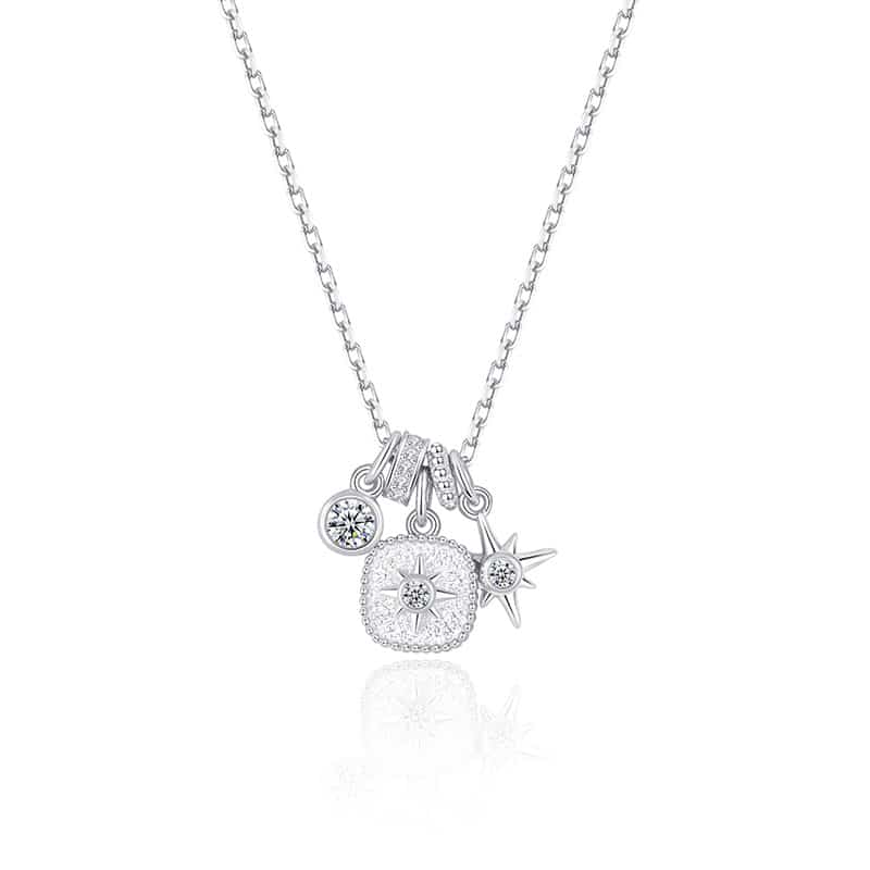 925 Sterling Silver North Star Necklace, featuring a sparkling cubic zirconia octagonal star pendant, a starry sky themed jewelry piece, made of hypoallergenic material, and a delicate 14K gold-plated starburst necklace.
