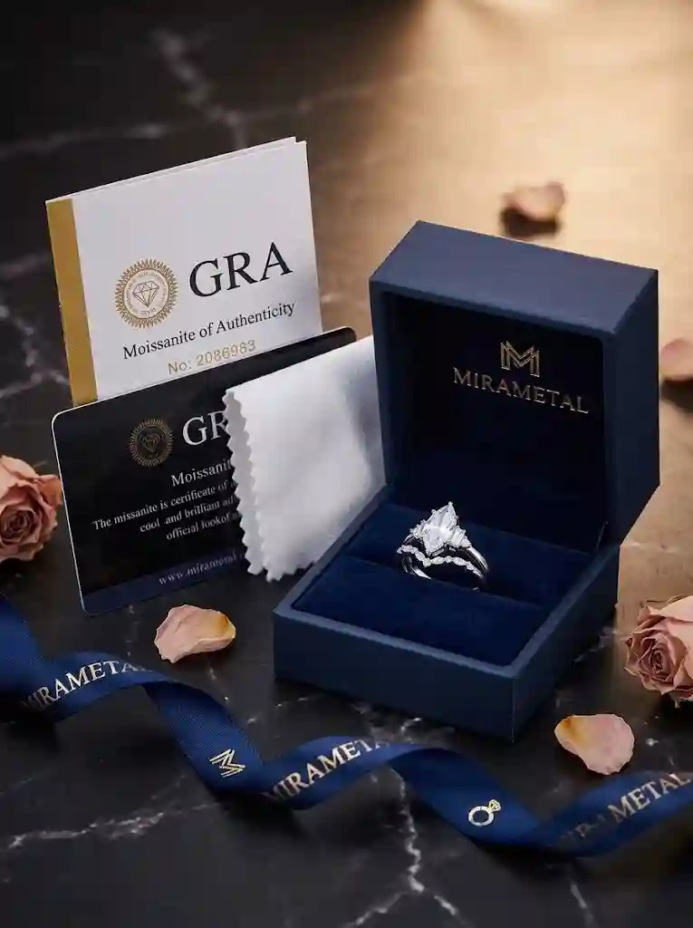 1.5ct moissanite ring in MIRAMETAL luxury dark navy gift box with GRA certificate card — factory direct jewelry since 2010