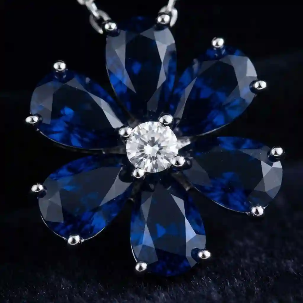 Daisy Flower Necklace 925 Sterling Silver - MIRAMETAL macro closeup of six teardrop blue CZ petals and white center stone detail