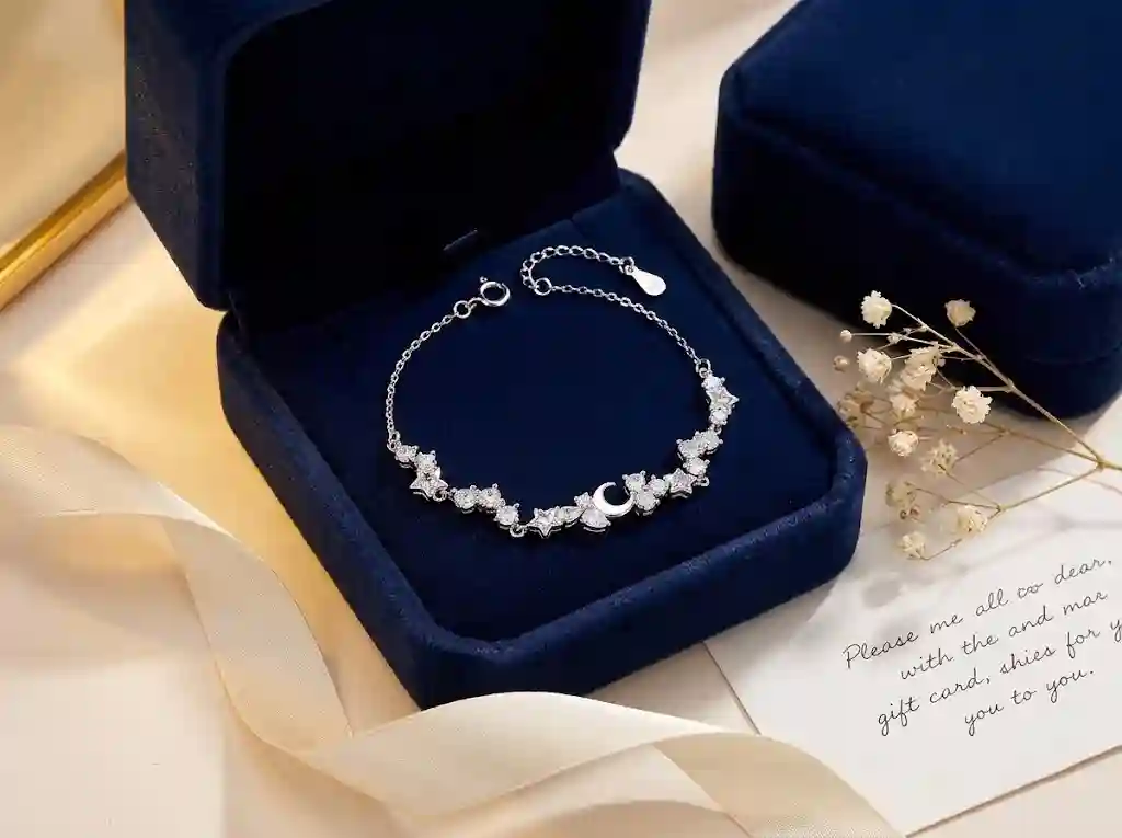 Luxury gift presentation of S999 silver star moon bracelet in navy velvet gift box with satin ribbon, holiday gifting ready