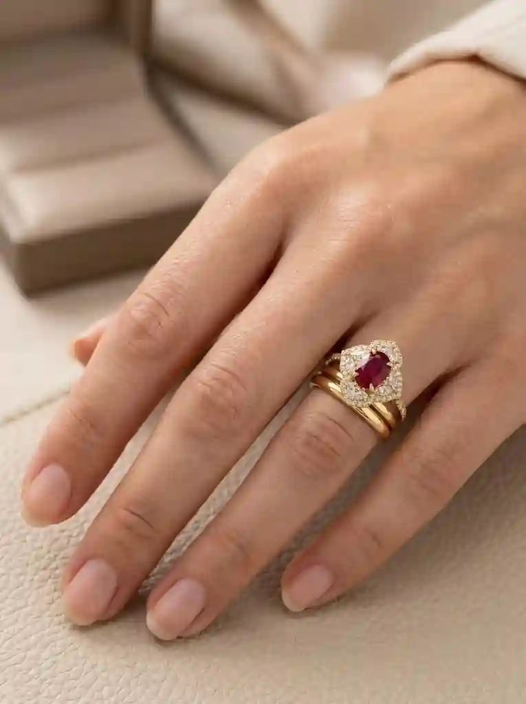 pigeon blood red floral ring styling guide stacked with other fine silver jewelry