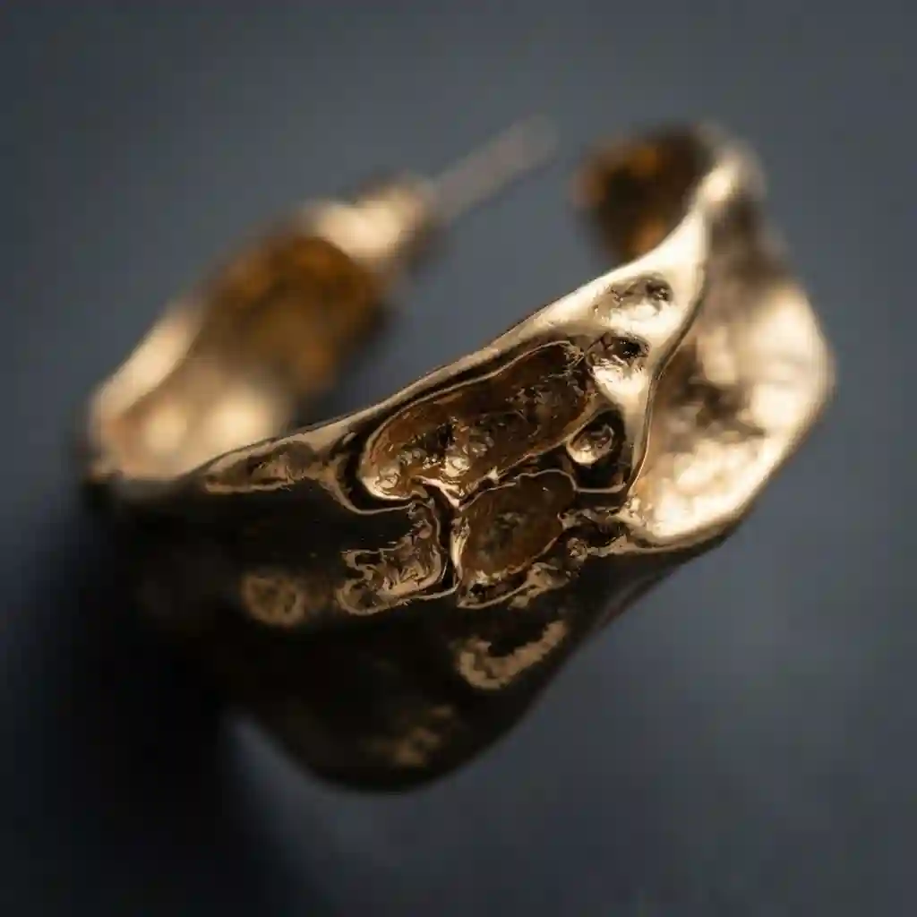 Extreme macro texture of lava earrings gold 18K vacuum plating MIRAMETAL
