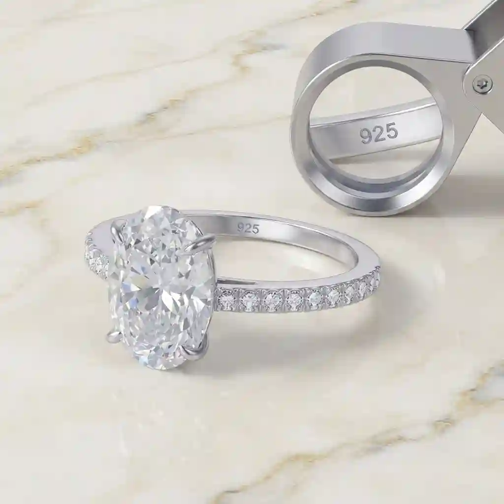 french vintage ring material specifications – 925 sterling silver rhodium-plated ring with oval white crystal center stone and pave diamond accent band, showing 925 hallmark, prong setting details, and premium metal finishing – MIRAMETAL quality jewelry craftsmanship