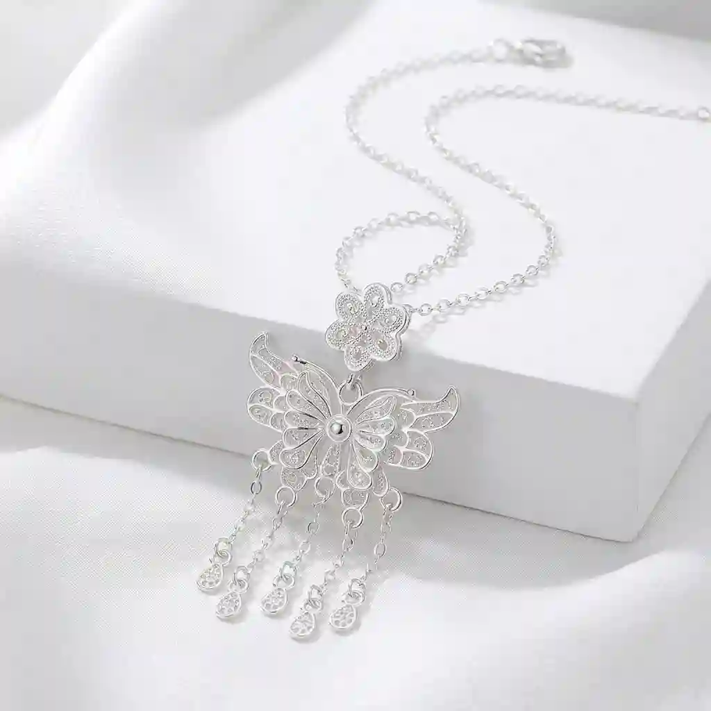 Handcrafted filigree butterfly pendant necklace in 990 sterling silver on an O-letter chain - MIRAMETAL ML-431