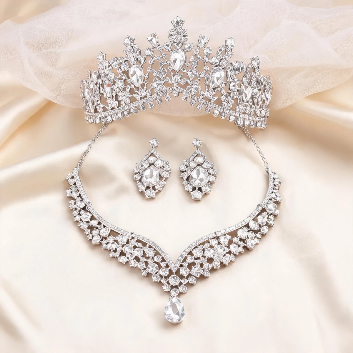 bridal jewelry set styling flat lay with veil
