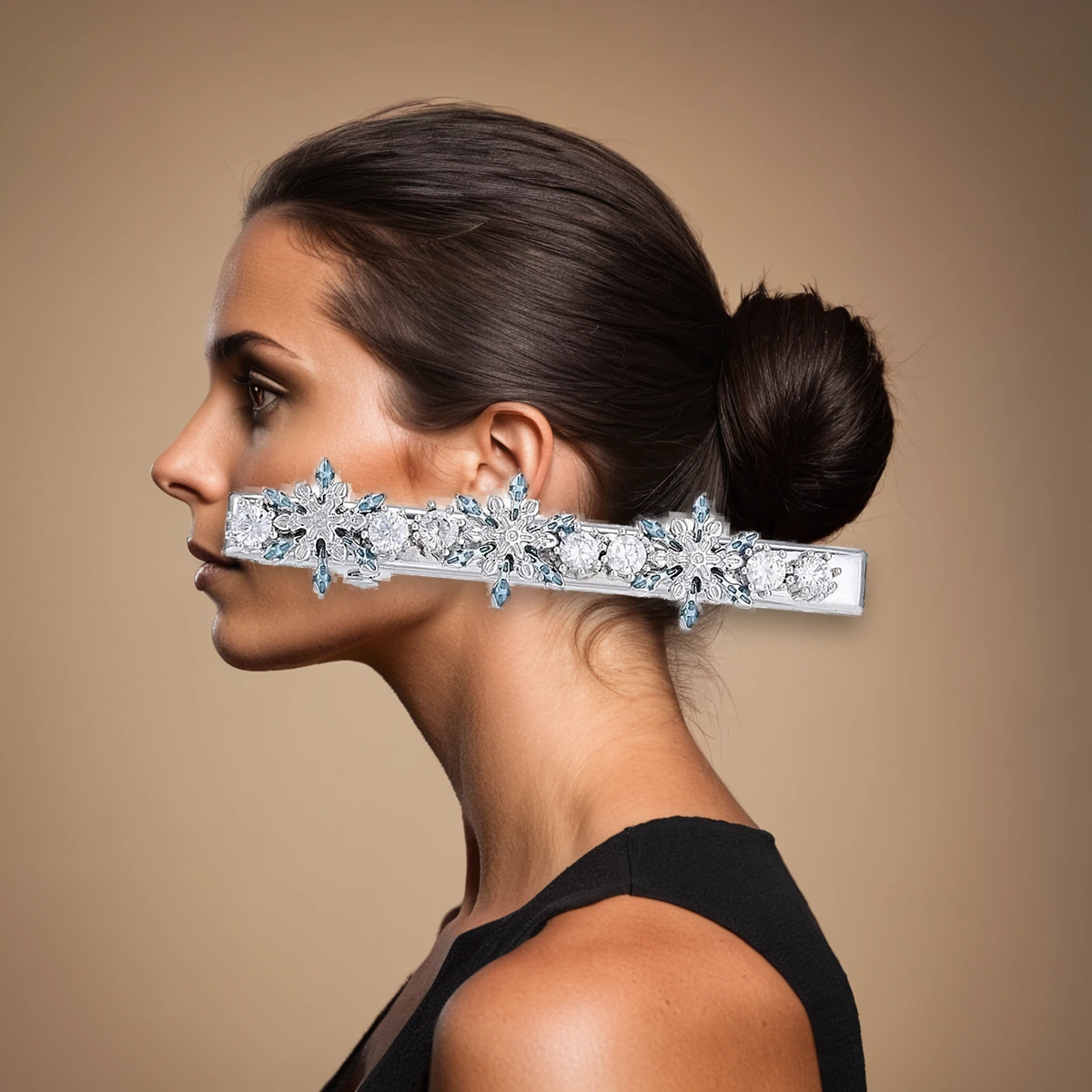 Crystal snowflake hair clip worn in a dark brunette low bun