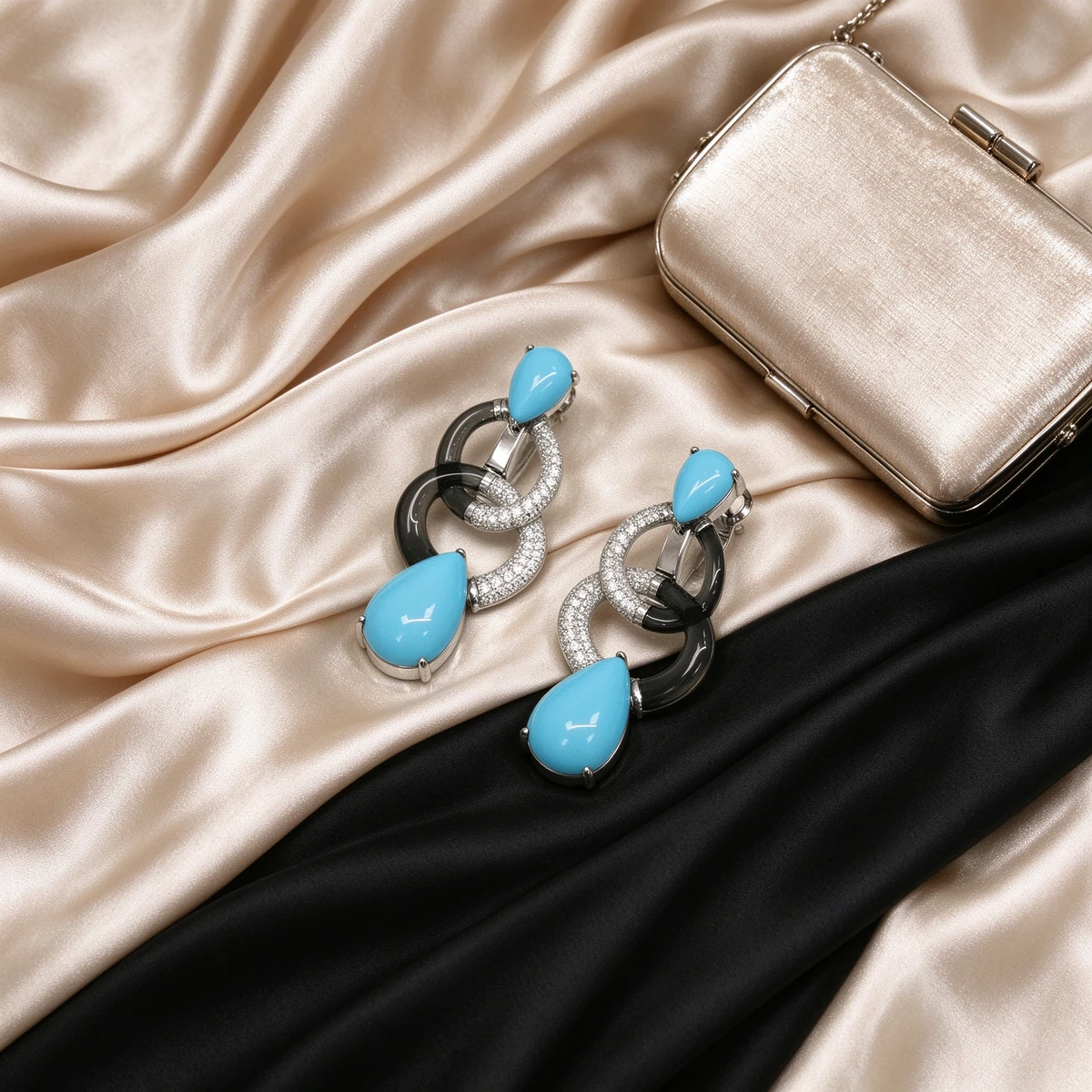 Turquoise drop earrings styled with an evening outfit