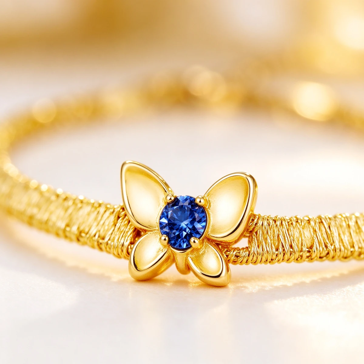 Gold Butterfly Bracelet Macro, Blue Stone Body Plain Gold Wings
