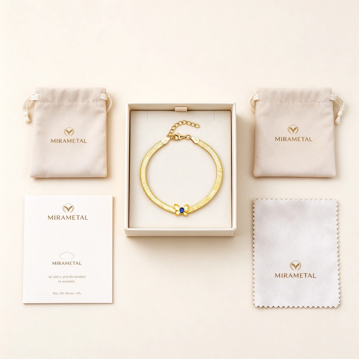 MIRAMETAL gold butterfly bracelet gift packaging set flat lay