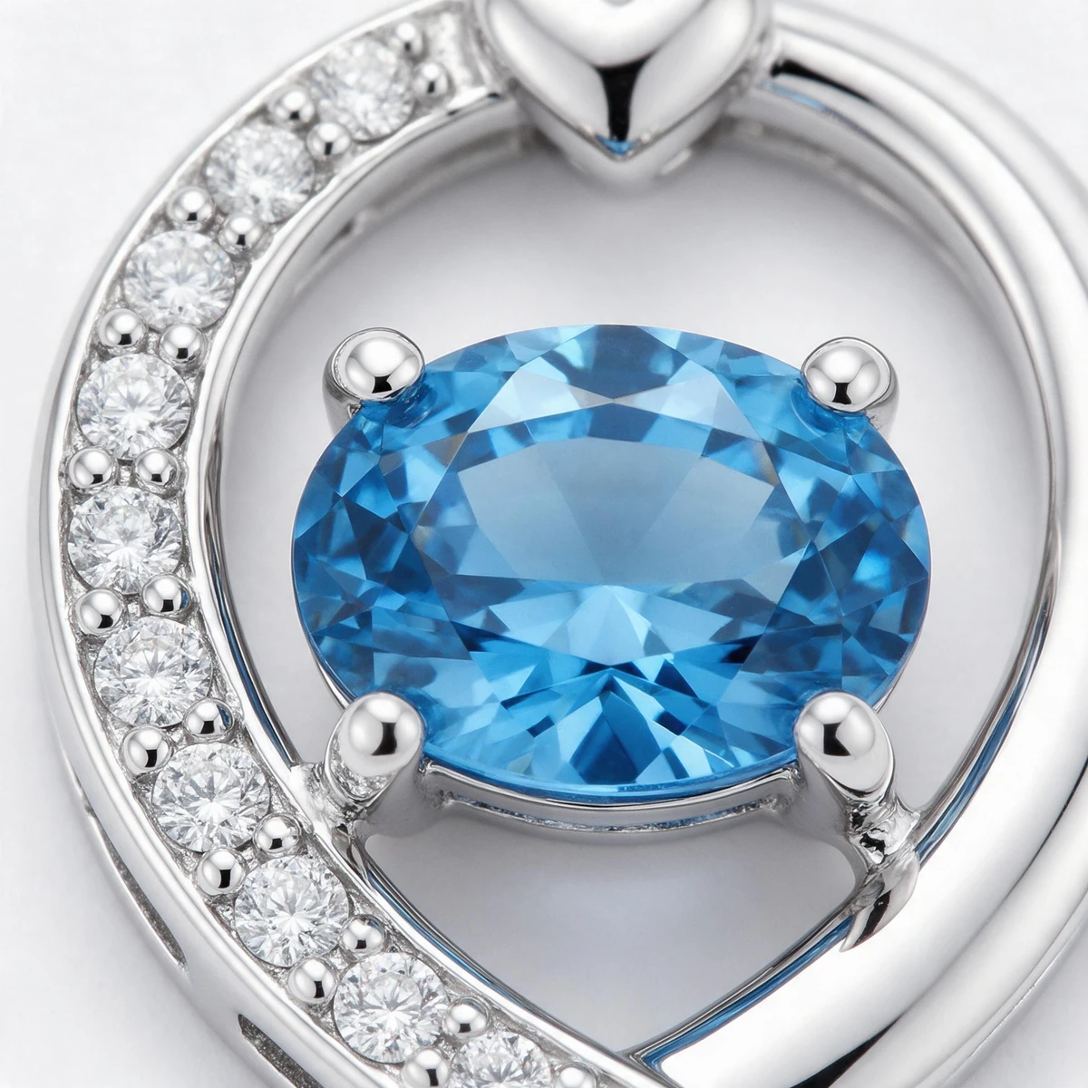 Macro Detail of Blue Sapphire Oval Brilliant-Cut Stone in 4-Prong Setting on 925 Sterling Silver Horseshoe Pendant MIRAMETAL Birthstone Necklace - blue sapphire necklace