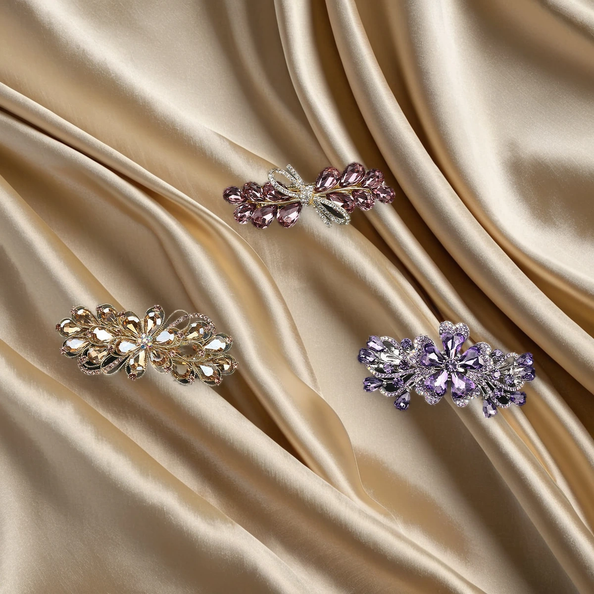 Design story crystal hair clip set with three coordinated floral barrettes