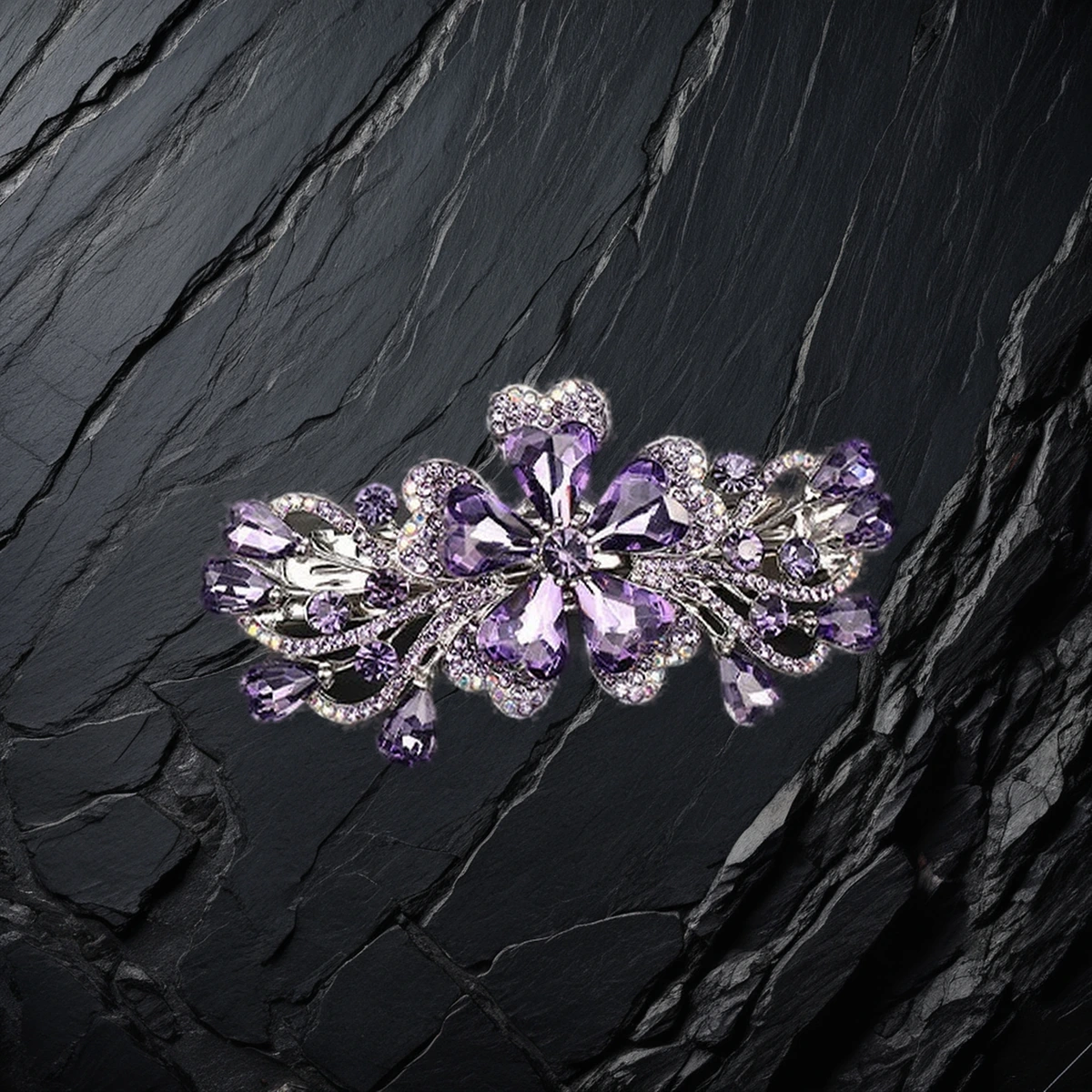 Purple crystal hair clip macro detail with faceted stone close up