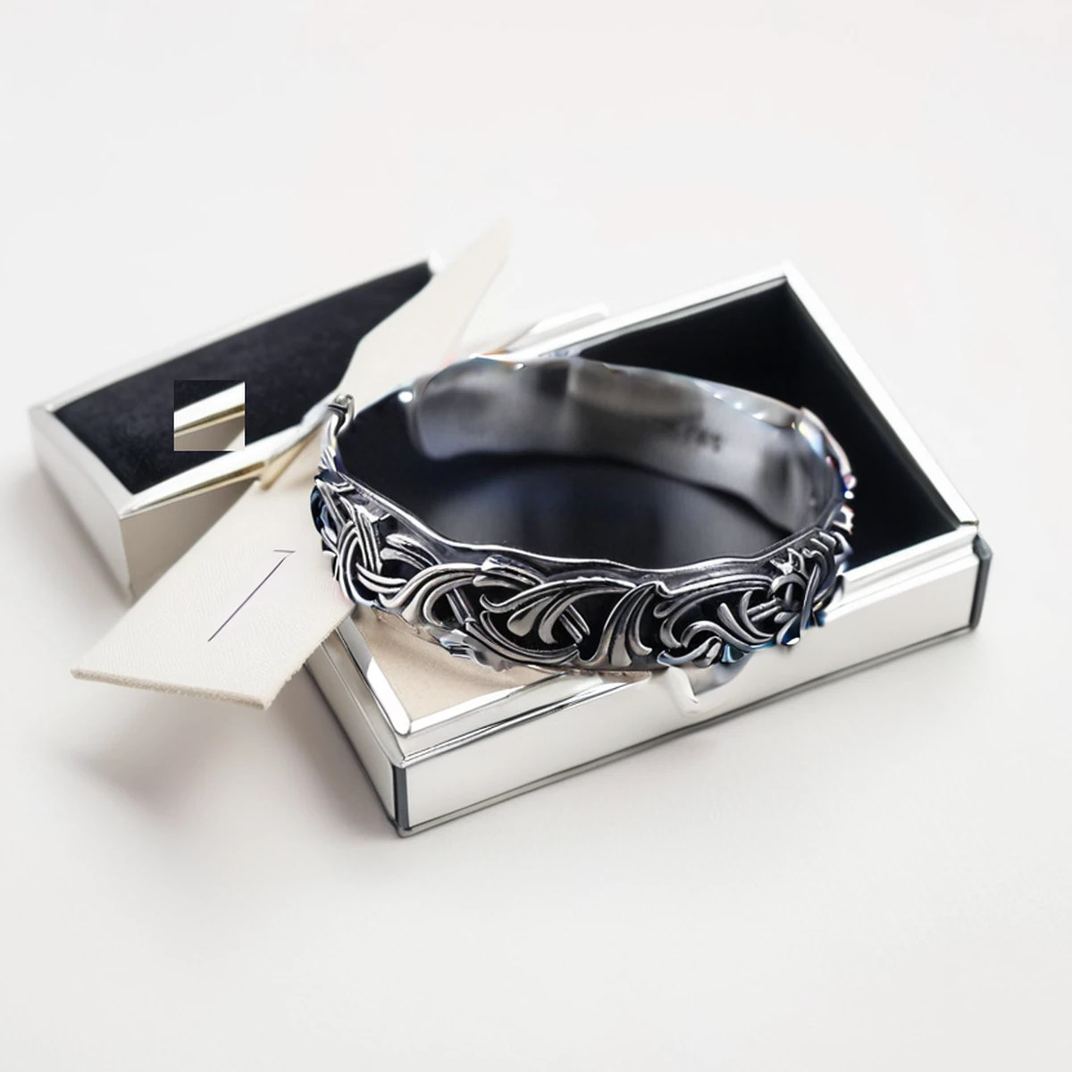 Oxidized silver cuff bracelet presented in a jewellery gift box