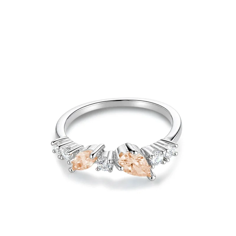 Silver stacking ring with clear and peach cubic zirconia in 925 sterling silver on white
