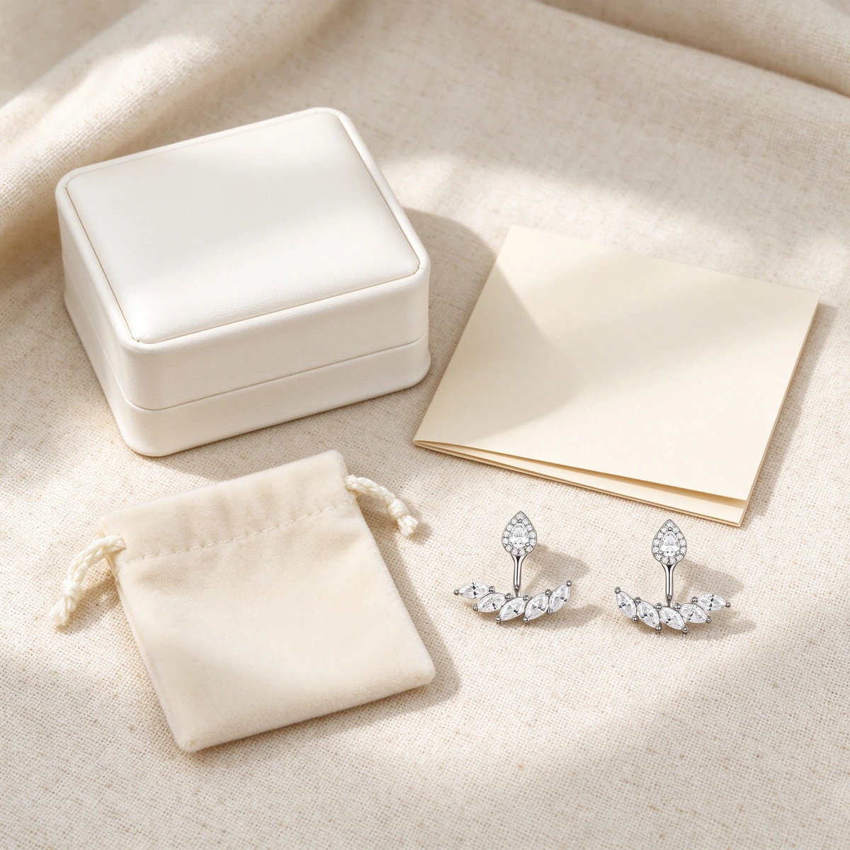 Teardrop moissanite earrings gift presentation with certificate