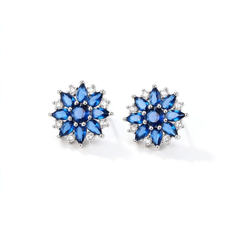 Blue spinel snowflake stud earrings in 925 sterling silver on pure white background