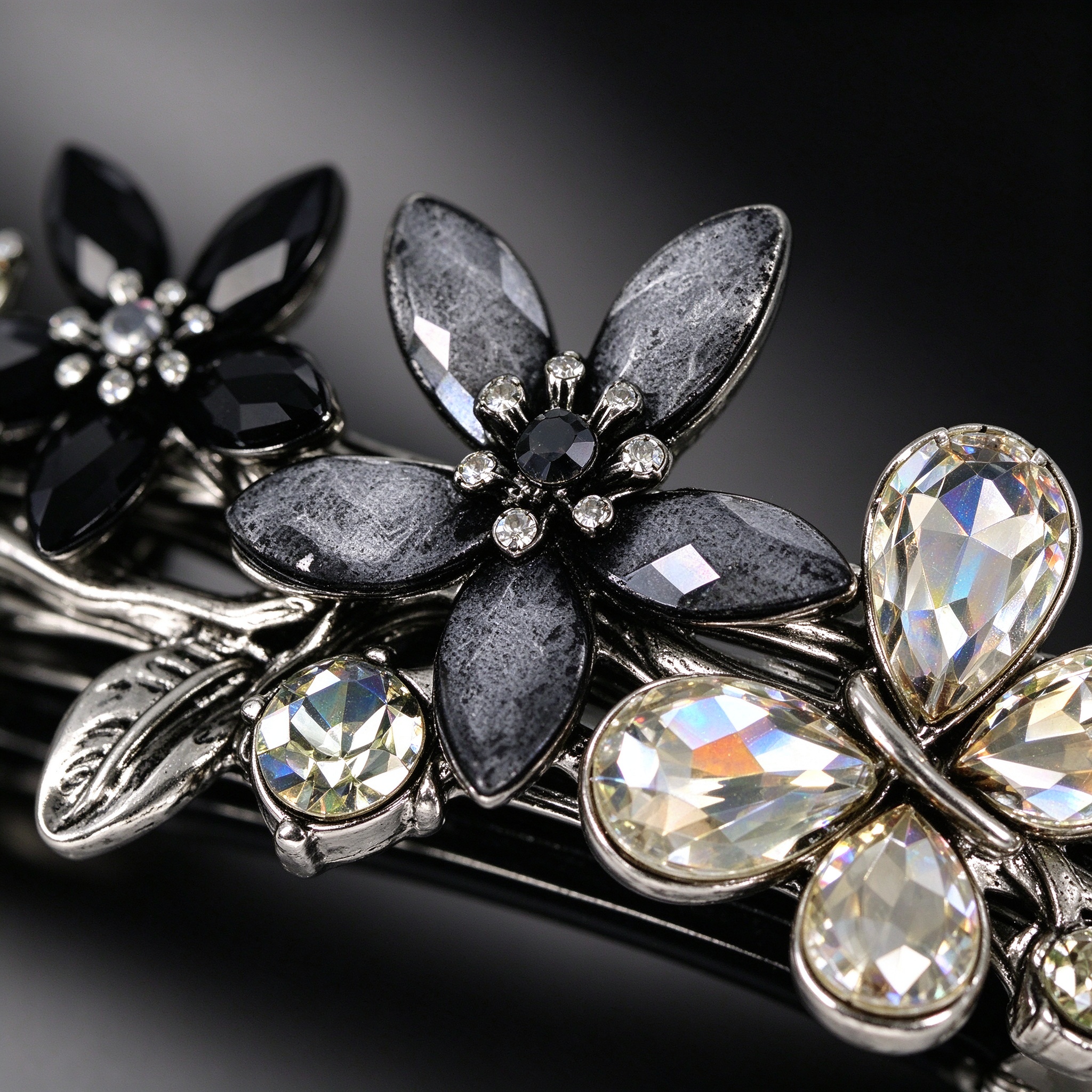 Close view of crystal rhinestones on the black silver flower hair clip
