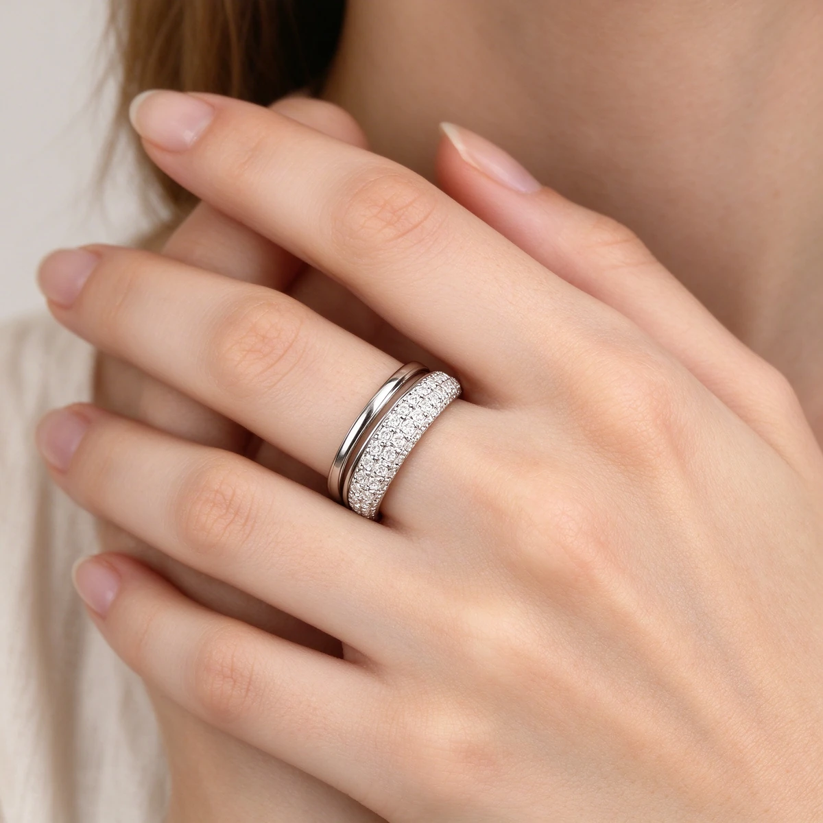 Pave eternity ring stacked with plain silver rings, boho styling