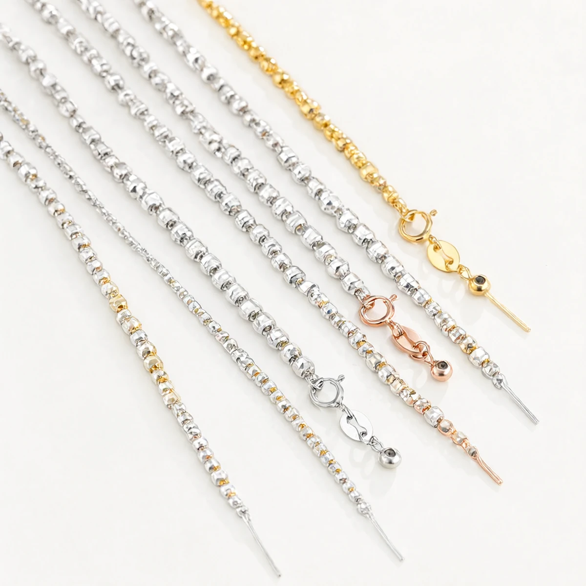 Close-up of Faceted Peanut Beads on S925 Silver Necklace, 1.5mm Diamond-Cut Bead Chain Detail in Gold and Silver - s925 silver peanut