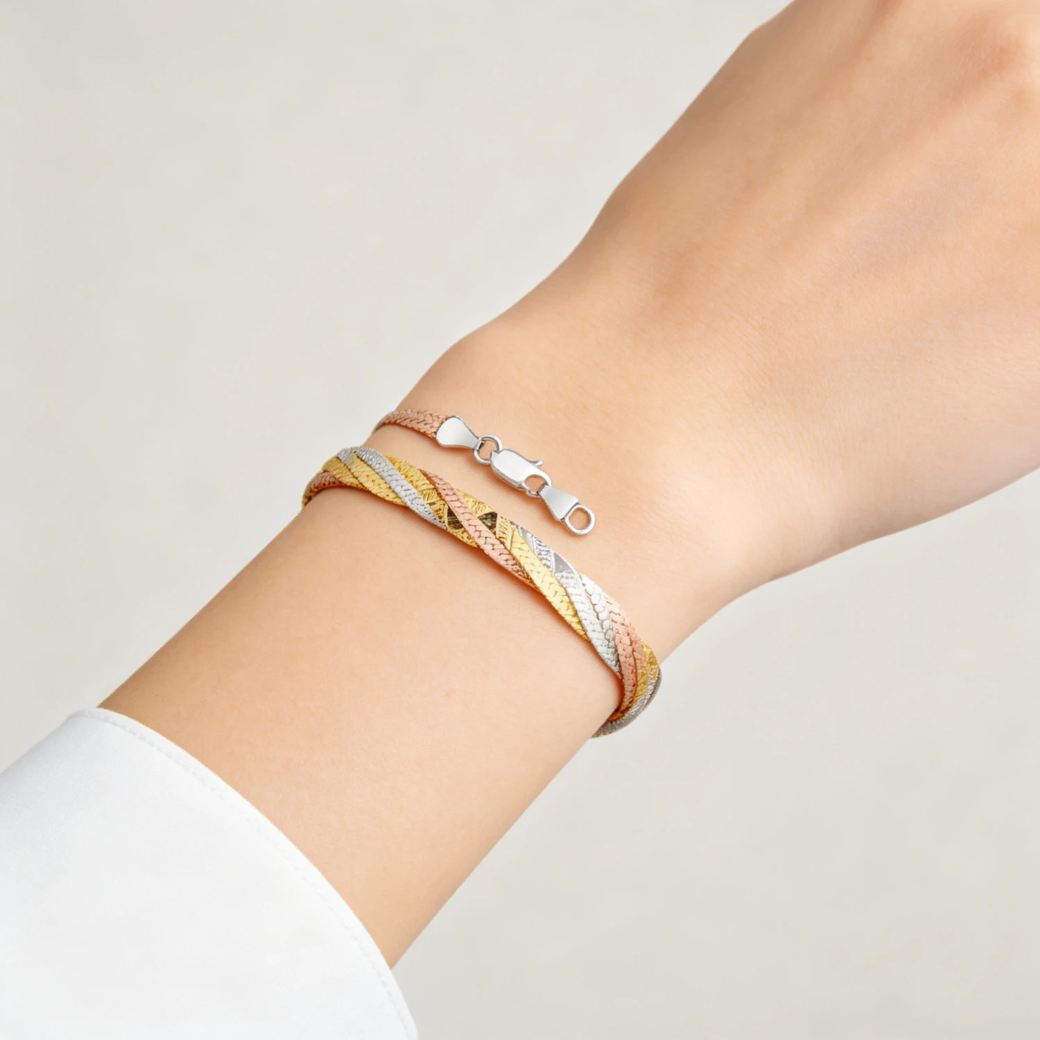 S925 silver three-line bracelet worn with a white shirt — everyday stacked styling on the wrist - s925 silver bracelet