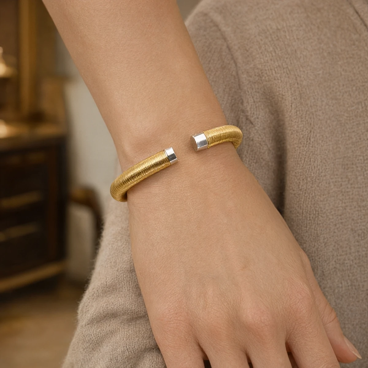 Western Model Wearing Two-Tone Wire-Wrapped S925 Silver Bangle, Gold and Rhodium Open Cuff Bracelet