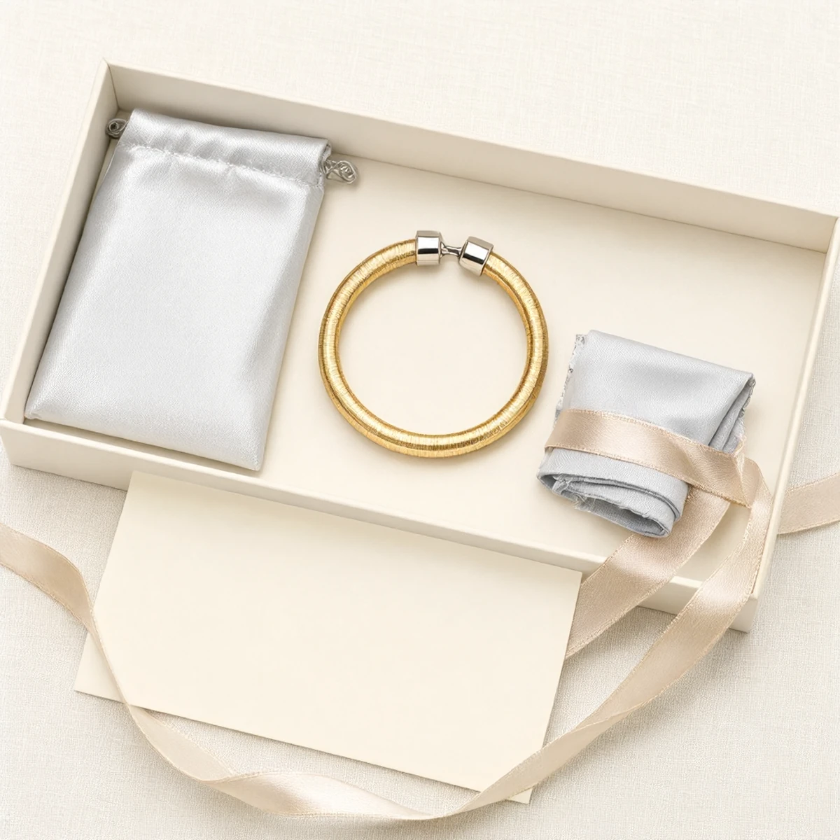 Complete packaging set of the S925 Silver Bangle — gift box, pouch, polishing cloth and warranty card