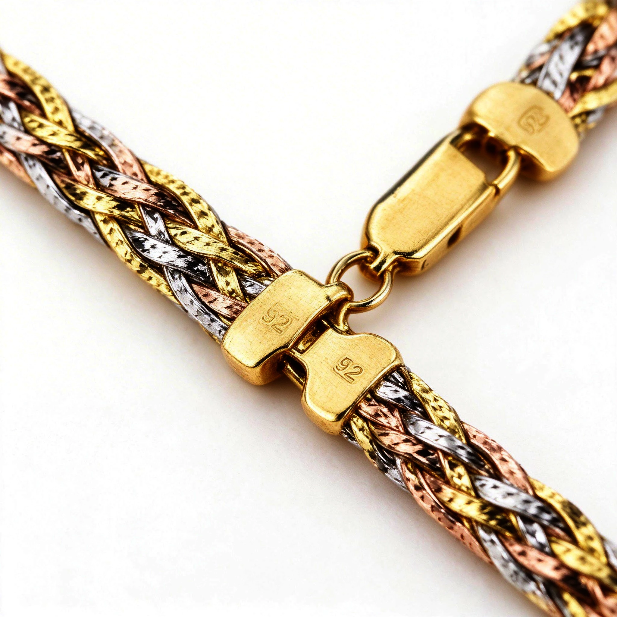 Lobster clasp detail of the braided silver necklace with 925 sterling silver stamp