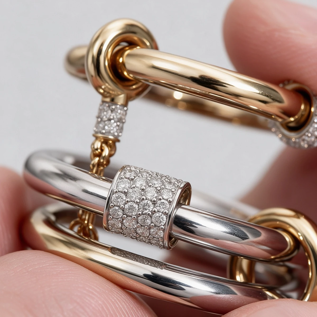 Styling guide wearing a two-tone chain link statement ring from desk to dinner