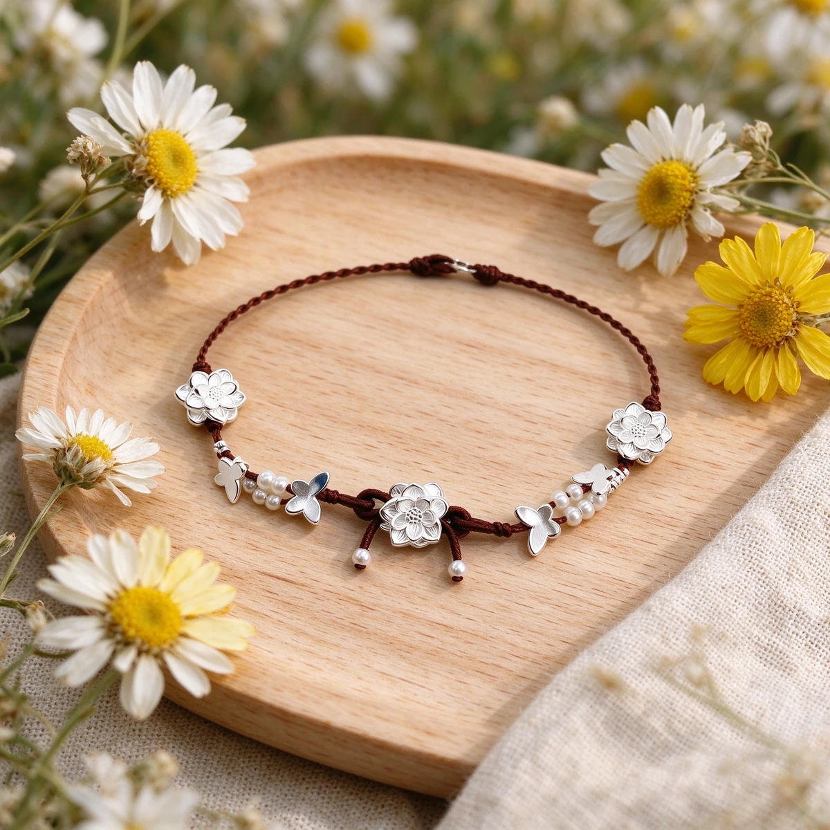 Lotus butterfly bracelet styled with dried flowers, boho pastoral bracelet scene